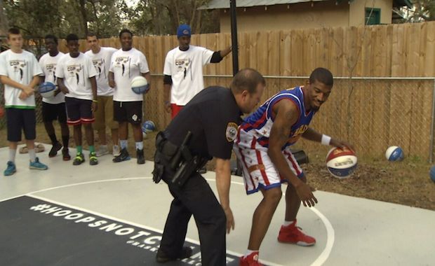 Cool Basketball Cop is Back and He’s Built a Brand New Backyard Court for Neighborhood Kids