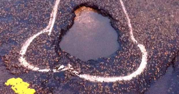 Hero Paints Penises Around Potholes So Officials Are Forced to Fill Them