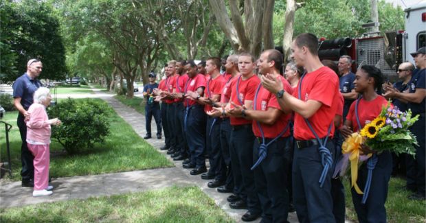 Firefighters Surprise Woman to Help Celebrate Her 100th Birthday