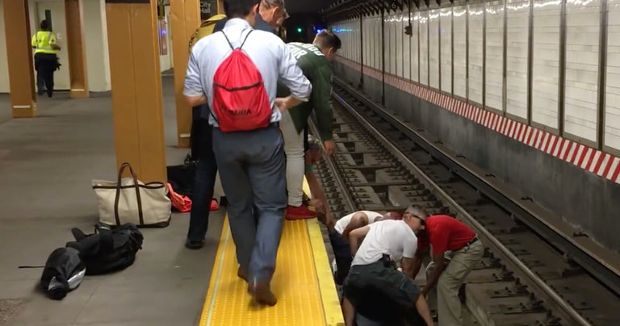 Watch the Rescue of an Unconscious Man Who Fell Onto Subway Tracks