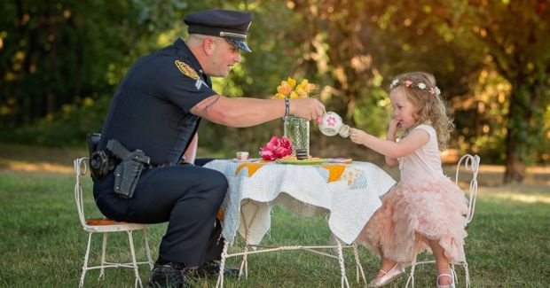 Police Officer Has Tea Party With Little Girl Whose Life He Saved
