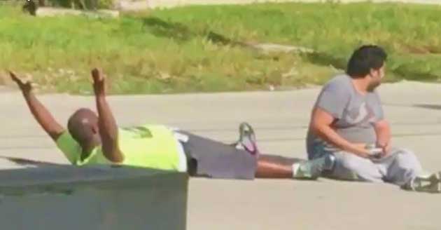Police Shoot Unarmed Black Man on Ground With His Hands Up as He Tries to Help Autistic Patient