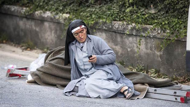 Harrowing Photo of Nun Who Survived Italy Earthquake Goes Viral