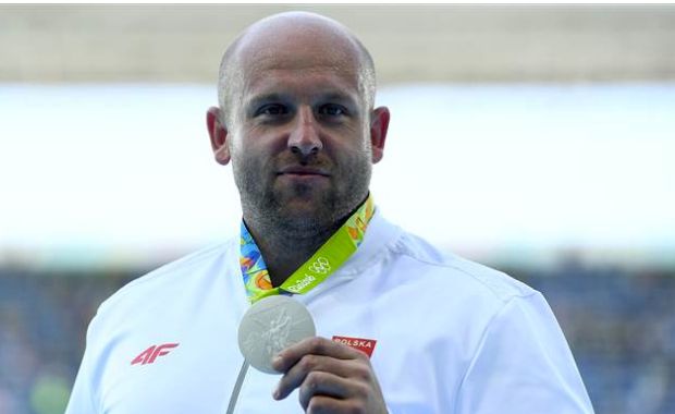 Polish Track Star Auctions Off Olympic Medal to Help Child With Cancer