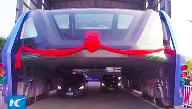 China Unveils Elevated Bus That Rides Right Over Traffic