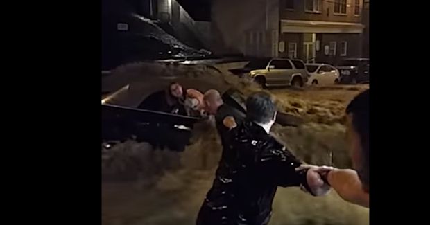 Group Creates Human Chain to Save Woman From Her Car After Record Flooding in Maryland