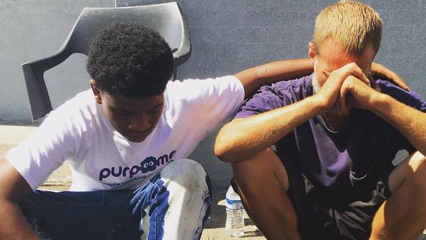 Heartwarming Video Shows 14-Year-Old Giving His Shoes to Homeless Man