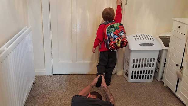 Father Shares Hilarious Photo of His Son Leaving for First Day of School