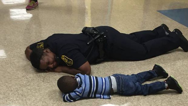 Cop Puts Herself on the Same Level as This Kid in the Most Heartwarming Way