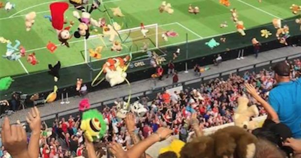 Dutch Football Fans Shower Sick Children With Stuffed Animals During Game