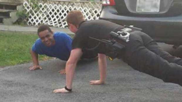 Cop Calms Agitated Autistic Boy With Push-Up Contest and People Are Loving It