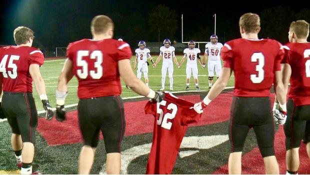 High School Football Players Honor Fallen Teammate With Moving Display