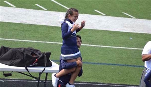 ROTC Teen Literally Lifts Spirits of Cheerleader Who Misses Military Dad