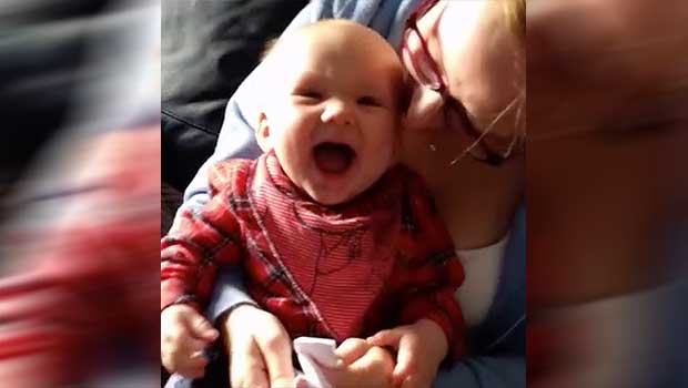 This Baby Enjoys the Simple Things in Life, Like Laughing Hysterically at Paper