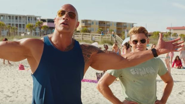 Watch Dwayne Johnson and Zac Efron Bring Us Back to the Beach in New ‘Baywatch’ Trailer