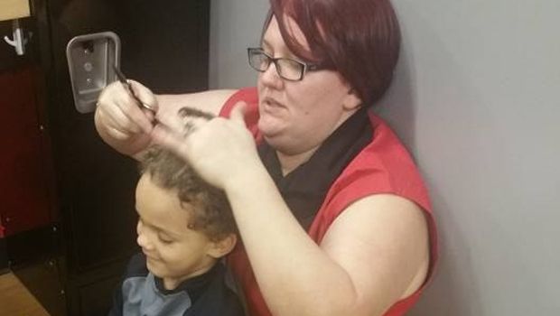 This Patient Hairstylist Sat on the Ground to Cut an Autistic Boy’s Hair