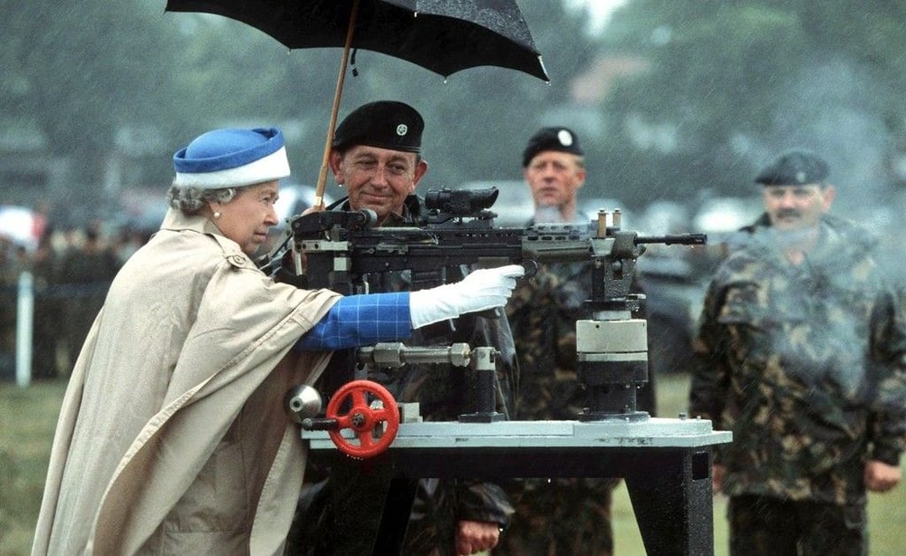 The Queen Shooting a Very Large Gun